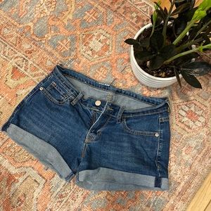 Dark denim cutoff shorts, rolled cuff